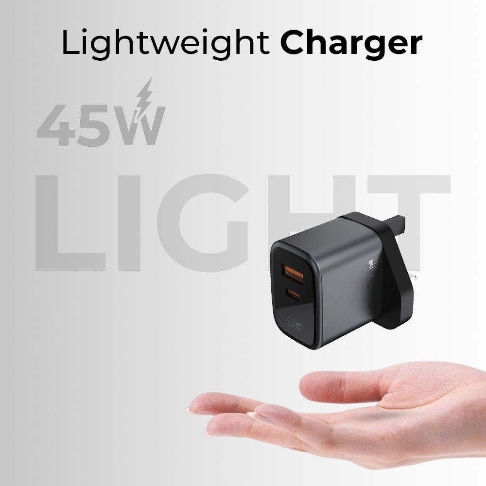 45W lightweight charger with a hand for scale on a light gray background