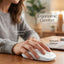 Person using a computer mouse with ergonomic support and relaxed design text overlay