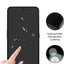 Smartphone with hydrophobic oleophobic coating and rounded edges, showing water droplets and a hand touch.