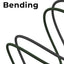 Anti-bending feature with coiled green and black cable on a white background