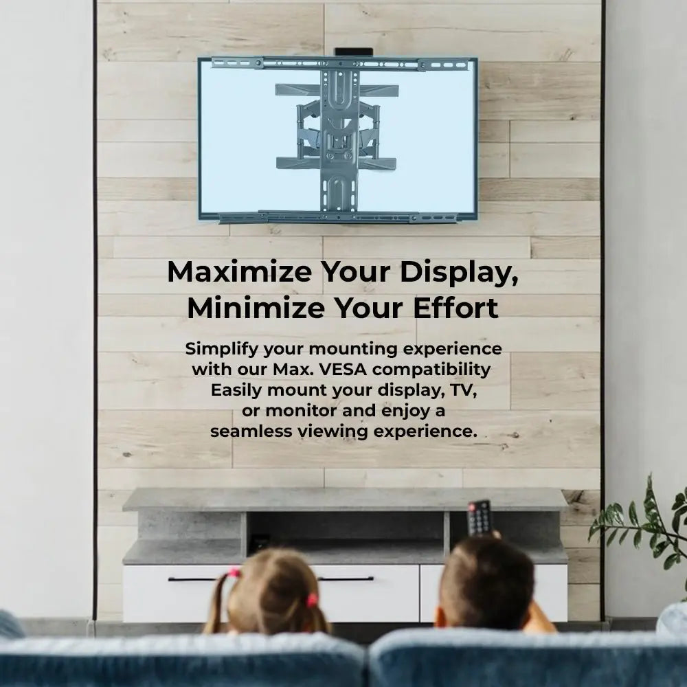 Children watching a TV mounted on a wall with text about VESA compatibility.