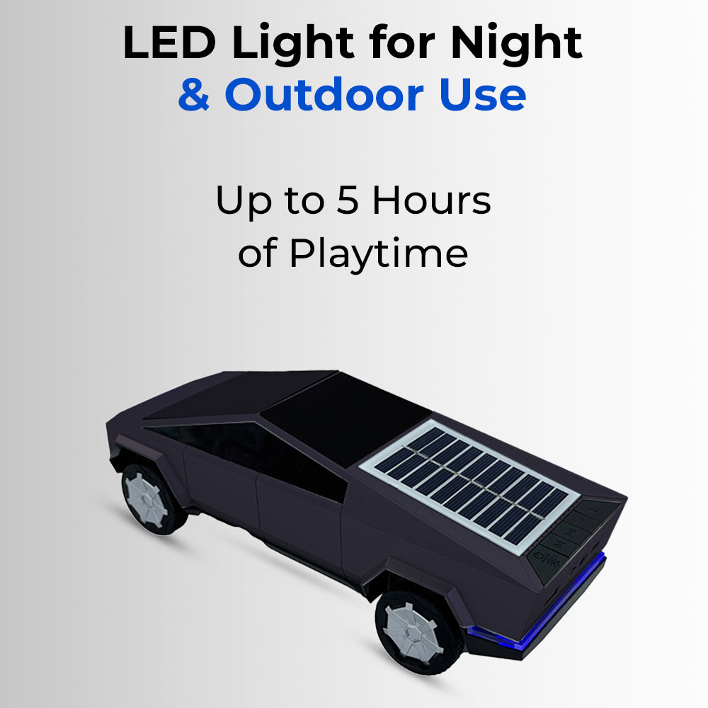Toy car with solar panel and LED light for night and outdoor use on a gray background