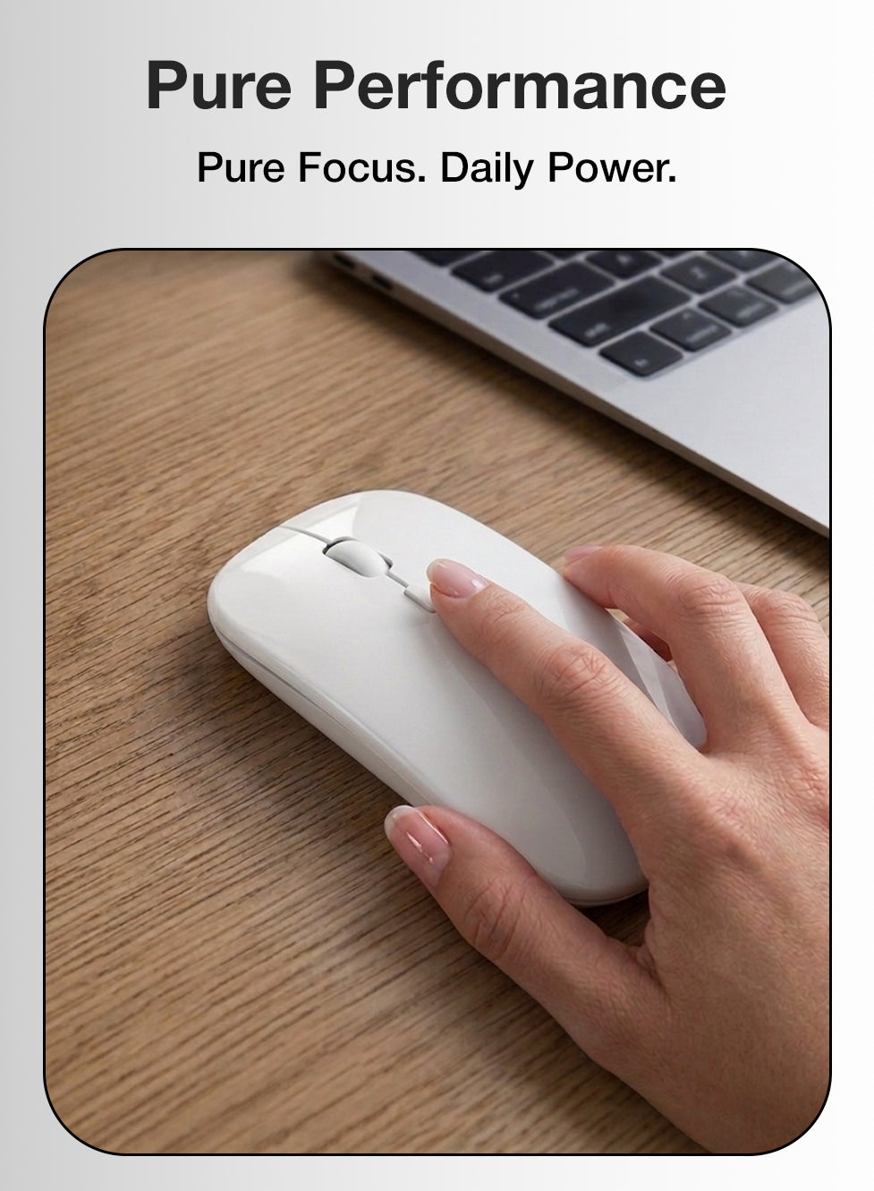 Hand using a white computer mouse on a wooden desk with a laptop in the background, featuring the text 'Pure Performance' and 'Pure Focus. Daily Power.