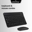 Black keyboard and mouse combo with Glassology branding on a light gray background