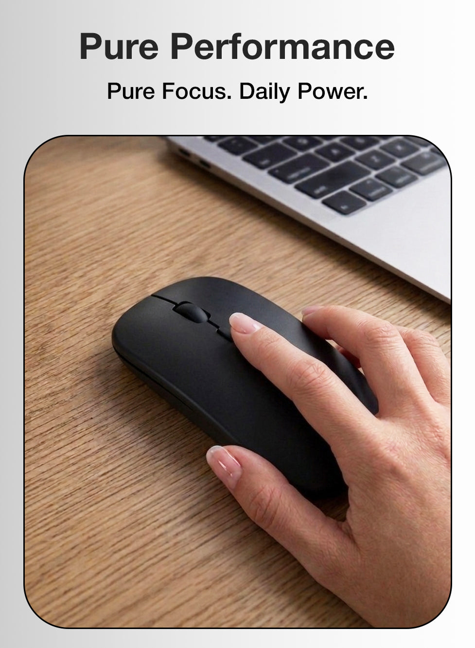Hand using a black wireless mouse on a wooden desk with a laptop in the background, featuring the text 'Pure Performance' and 'Pure Focus. Daily Power.