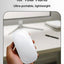 Hand holding a white ergonomic mouse with text about design and portability.