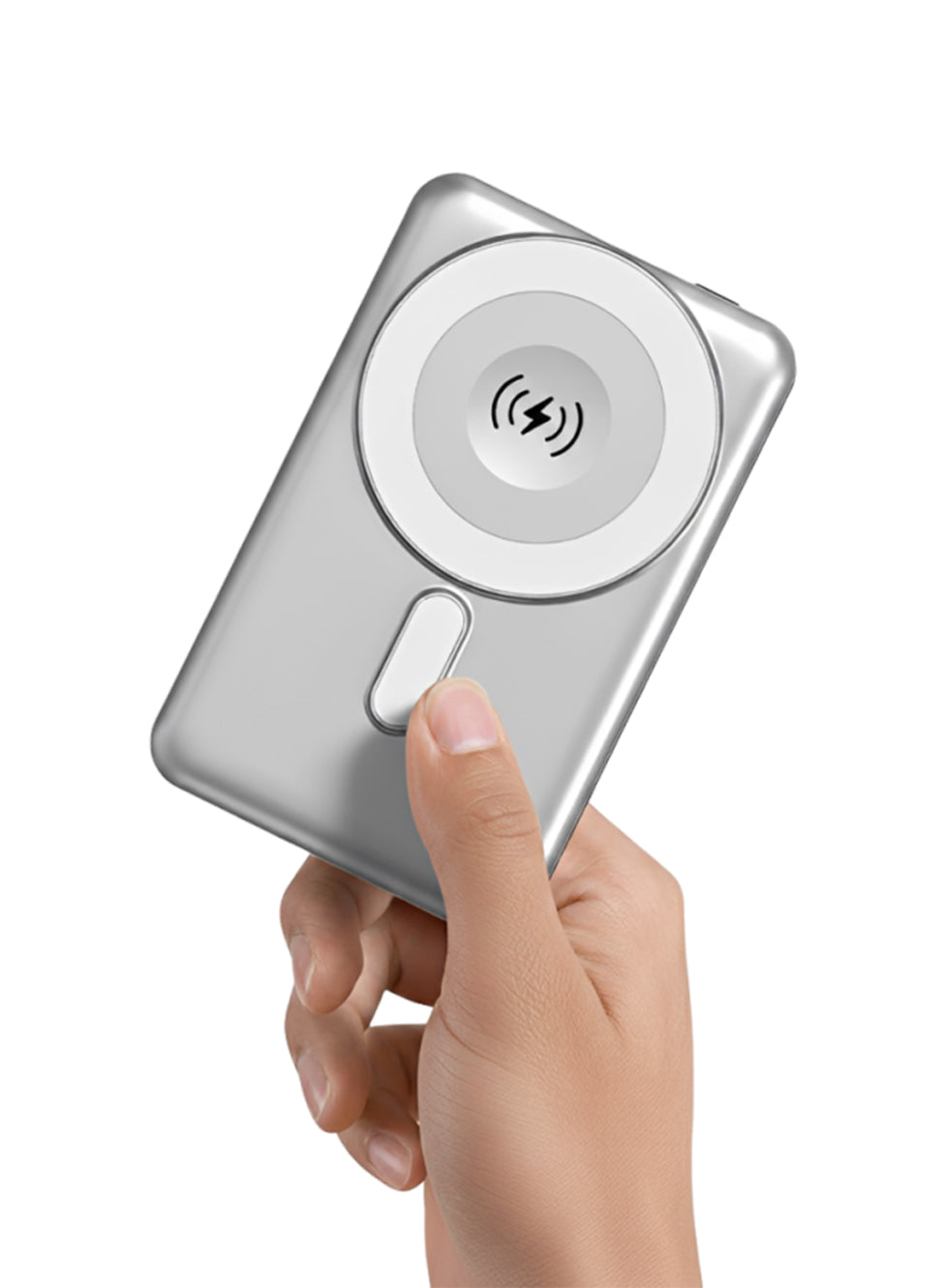 Hand holding a silver wireless charging pad with a white background
